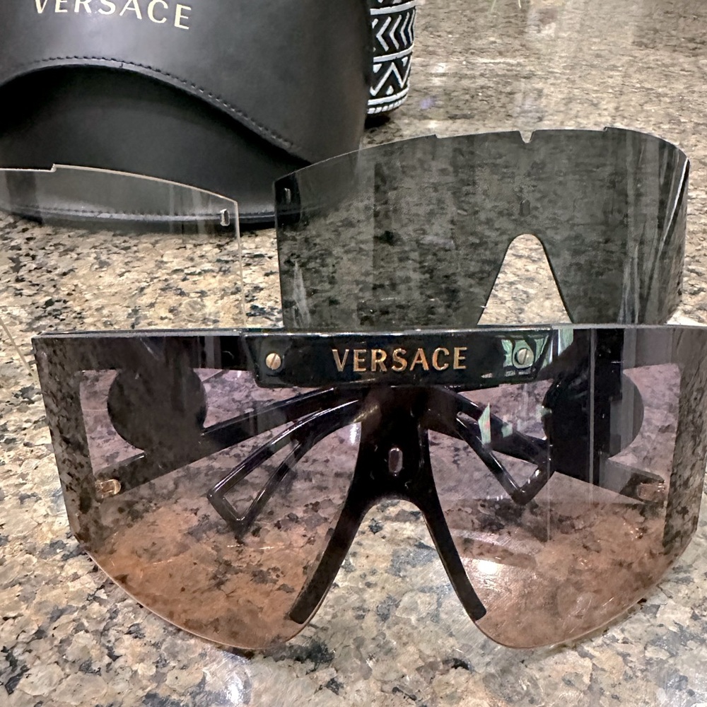 Versace sunglasses with two addition shades to go with the original.